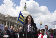 Executive Director of the National Center for Transgender Equality Mara Keisling (C) speaks during a news conference, voicing opposition to US President Donald J. Trump's policy banning transgender people in the military on 26 July 2017. (EPA Photo)