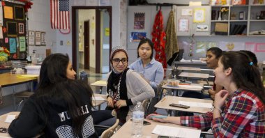 In this file photo, students chat in class before an after-hours study session for their math final at Northwest High School in Germantown, Maryland, U.S., May 10, 2016. (AP File Photo)