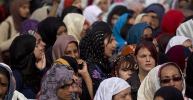 Muslim women attend an open-air funeral service in Summerfield Park, Birmingham, England, Aug. 18, 2011. (AP File Photo)