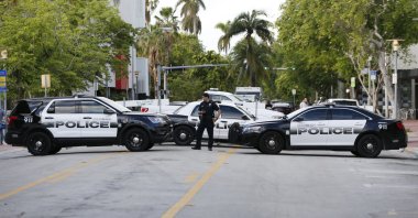 Police block roads leading in the South Beach neighborhood of Miami Beach, Florida, Oct. 31, 2017. (AP Photo)