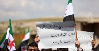 Relatives and loved ones of the victims killed in Assad regime&#039;s chemical attack in Khan Sheikhoun attend a protest, urging justice, April 4, 2025. (AA Photo)