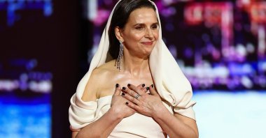 Juliette Binoche, Jury President of the 78th Cannes Film Festival gestures on stage during the opening ceremony and the screening the film &amp;quot;Partir un jour&amp;quot; (Leave One Day) Out of competition at the 78th Cannes Film Festival in Cannes, France, May 13, 2025. (Reuters Photo)