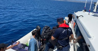 The coast guard rescues migrants in southern Muğla province, Türkiye, May 20, 2025 (AA Photo)