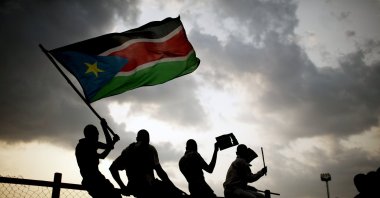 Southern Sudanese wave the national flag in the capital Juba, July 10, 2011. (AP Photo)