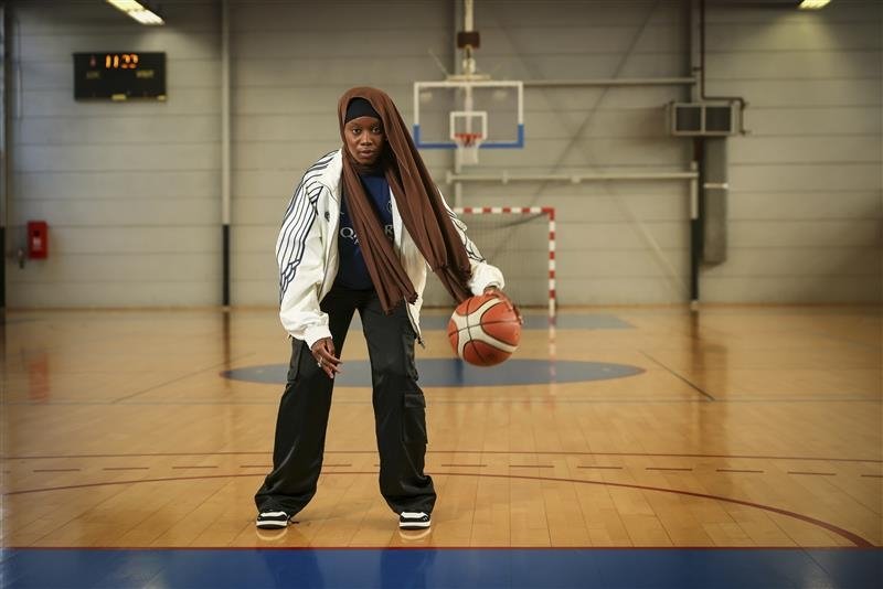 Former player Salimata Sylla poses before a women’s basketball tournament where players can wear a headscarf, Aubervilliers near Paris, April 27, 2025. (AP Photo)