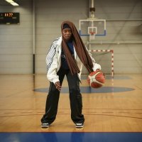 Former player Salimata Sylla poses before a women’s basketball tournament where players can wear a headscarf, Aubervilliers near Paris, April 27, 2025. (AP Photo)