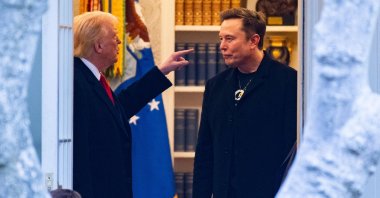 U.S. President Donald Trump and Elon Musk (R) speak before departing the White House on his way to his South Florida home in Mar-a-Lago in Florida, U.S., March 14, 2025. (AFP Photo)