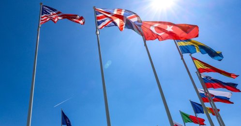 Flags of NATO member countries flutter during a ceremony at NATO headquarters, Brussels, Belgium, April 28, 2025. (EPA Photo)