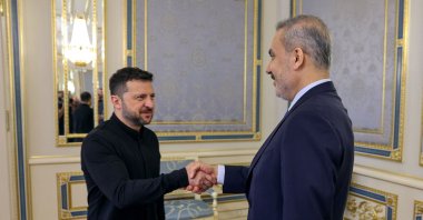 Ukrainian President Volodymyr Zelenskyy (L) shakes hands with Foreign Minister Hakan Fidan during their meeting, Kyiv, Ukraine, May 30, 2025. (AFP Photo)