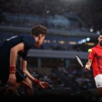A ball boy passes a ball to Serbia&#039;s Novak Djokovic before serving to Austria&#039;s Filip Misolic during their men&#039;s singles match on day 7 of the French Open tennis tournament on Court Philippe-Chatrier at the Roland-Garros Complex, Paris, France, May 31, 2025. (AFP Photo)