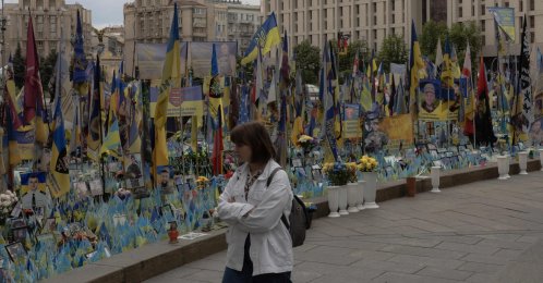 A woman visits a memorial for the fallen Ukrainian and foreign fighters on the Independence Square in Kyiv, Ukraine, May 14, 2025. (AFP Photo)