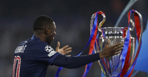 Paris Saint-Germain&#039;s Ousmane Dembele with the trophy after collecting his Champions League winner&#039;s medal at the Allianz Arena, Munich, Germany, May 31, 2025. (Reuters Photo)