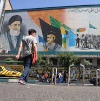 Iranians walk past portraits of Ayatollah Ali Khamenei (L) and late Iranian supreme leader Ayatollah Ruhollah Khomeini in Tehran, Iran, June 1, 2025. (EPA Photo)
