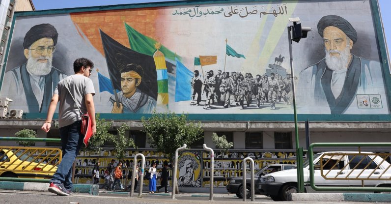 Iranians walk past portraits of Ayatollah Ali Khamenei (L) and late Iranian supreme leader Ayatollah Ruhollah Khomeini in Tehran, Iran, June 1, 2025. (EPA Photo)