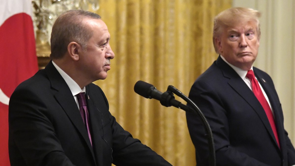 President Donald Trump looks to President Recep Tayyip Erdoğan as a reporter asks a question at a press conference in the East Room of the White House in Washington, D.C., Nov. 13, 2019. (EPA Photo)